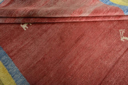 Full view of 2000s Persian Gabbeh rug from Iran / Persia, 268 × 217 cm in Red tones