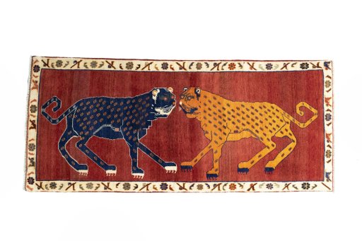 Full view of 2000s Persian Gabbeh rug from Iran / Persia, 235 × 102 cm in Red tones