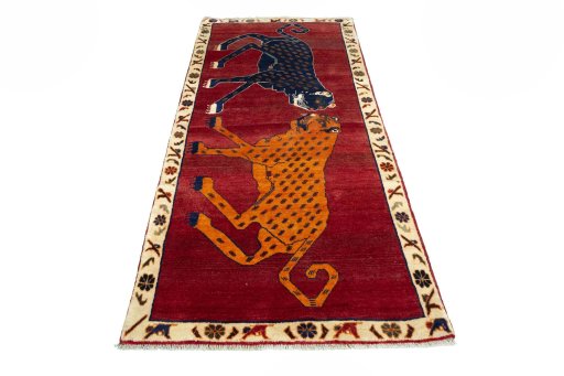Surface texture of 2000s Persian Gabbeh rug with natural Wool and intricate pattern