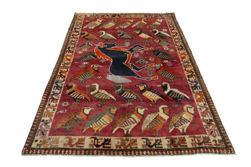 Surface texture of 2000s Persian Gabbeh rug with natural Wool and intricate pattern