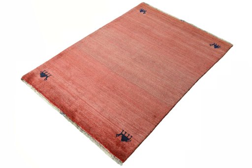 Corner detail of 2000s Persian Gabbeh rug showing border pattern and Wool pile