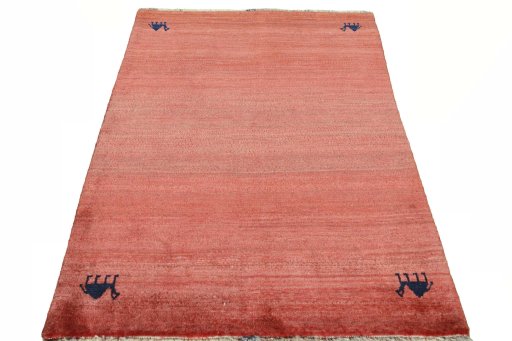 Surface texture of 2000s Persian Gabbeh rug with natural Wool and intricate pattern