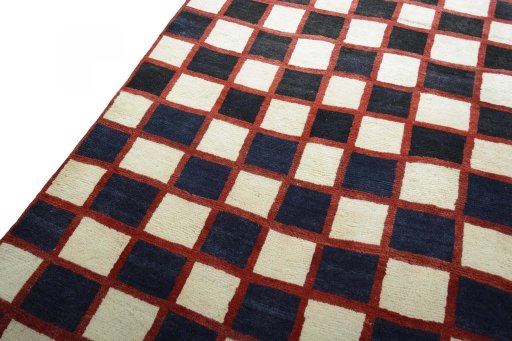Backside of handmade 2000s Persian Gabbeh rug showing knot structure and weave density