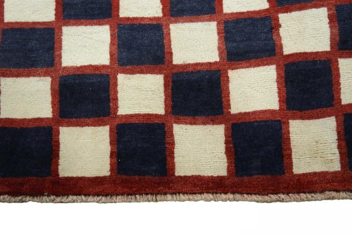 Central medallion detail of 2000s Persian Gabbeh rug from Iran / Persia