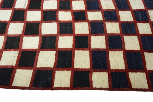 Close-up detail of 2000s Persian Gabbeh rug from Iran / Persia showing Wool weave