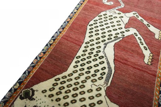 Backside of handmade 2000s Persian Gabbeh rug showing knot structure and weave density