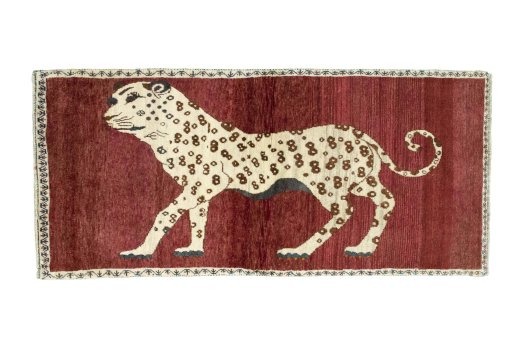 Full view of 2000s Persian Gabbeh rug from Iran / Persia, 177 × 83 cm in Red tones