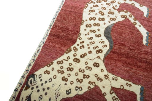 Backside of handmade 2000s Persian Gabbeh rug showing knot structure and weave density