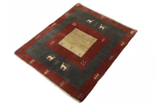 Corner detail of New Persian Gabbeh rug showing border pattern and Wool pile