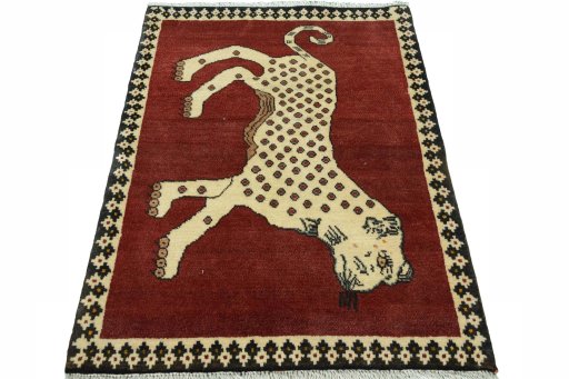 Surface texture of 2000s Persian Gabbeh rug with natural Wool and intricate pattern