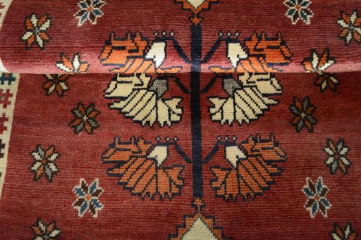 Full view of 2000s Persian Gabbeh rug from Iran / Persia, 145 × 92 cm in Red tones
