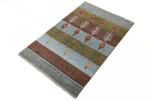 Corner detail of 2000s Persian Gabbeh rug showing border pattern and Wool pile