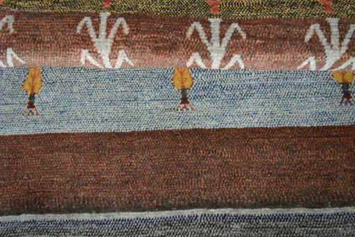 Close-up detail of 2000s Persian Gabbeh rug from Iran / Persia showing Wool weave