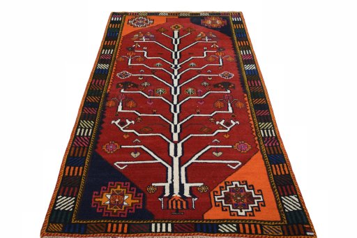 Surface texture of 2000s Persian Gabbeh rug with natural Wool and intricate pattern