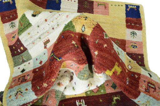 Corner detail of New Persian Gabbeh rug showing border pattern and Wool pile