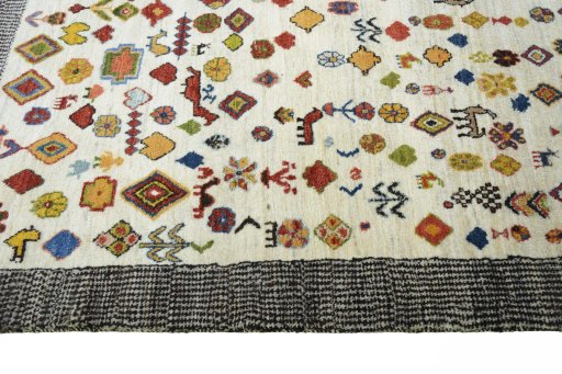 Close-up detail of 2000s Persian Gabbeh rug from Iran / Persia showing Wool weave