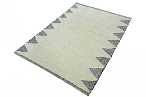 Corner detail of New Persian Gabbeh rug showing border pattern and Wool pile