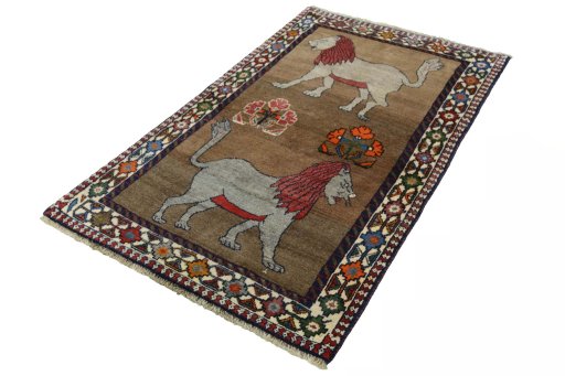 Corner detail of 2000s Persian Gabbeh rug showing border pattern and Wool pile