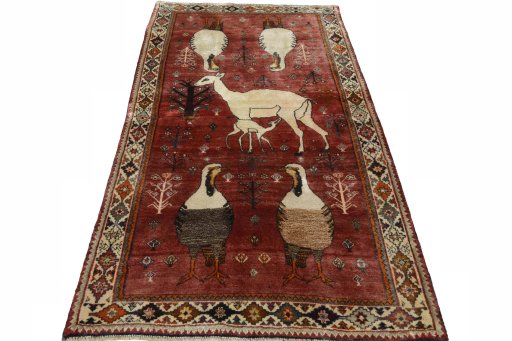 Surface texture of 2000s Persian Gabbeh rug with natural Wool and intricate pattern
