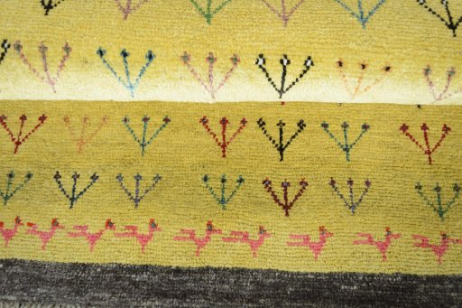Full view of 2000s Persian Gabbeh rug from Iran / Persia, 162 × 91 cm in Yellow tones