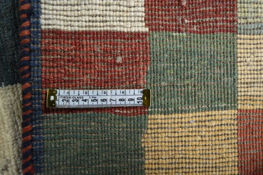 Close-up detail of 2000s Persian Gabbeh rug from Iran / Persia showing Wool weave