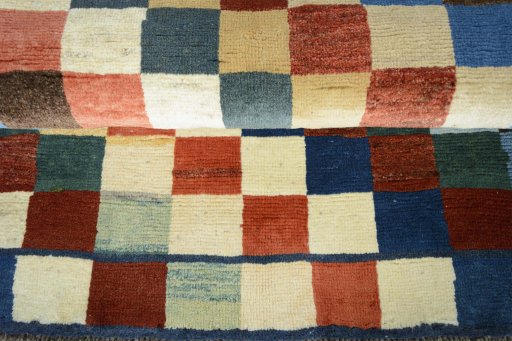 Full view of 2000s Persian Gabbeh rug from Iran / Persia, 146 × 98 cm in Multi Color tones