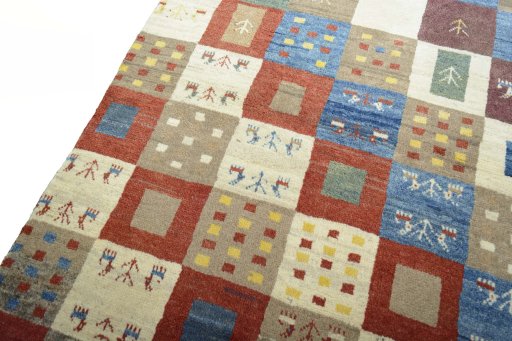 Backside of handmade New Persian Gabbeh rug showing knot structure and weave density