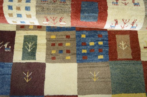 Full view of New Persian Gabbeh rug from Iran / Persia, 140 × 100 cm in Multi Color tones
