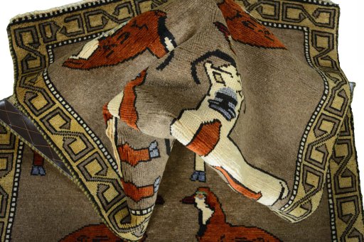 Corner detail of 2000s Persian Gabbeh rug showing border pattern and Wool pile