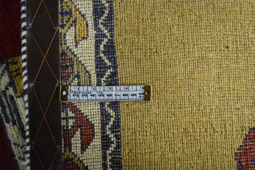 Close-up detail of 2000s Persian Gabbeh rug from Iran / Persia showing Wool weave