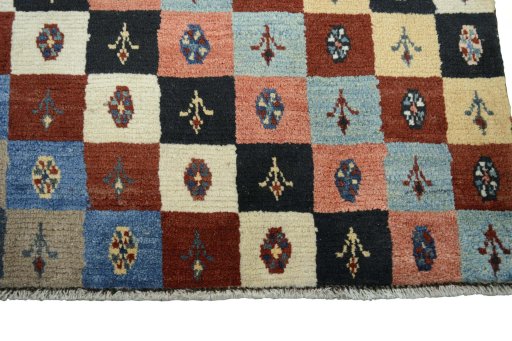 Central medallion detail of 2000s Persian Gabbeh rug from Iran / Persia