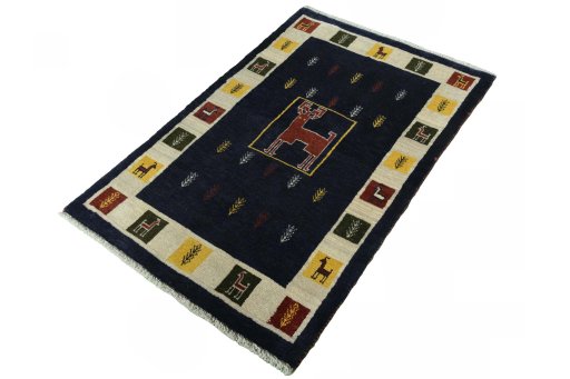 Corner detail of New Persian Gabbeh rug showing border pattern and Wool pile