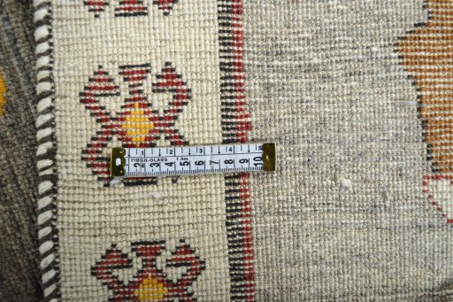 Close-up detail of 2000s Persian Gabbeh rug from Iran / Persia showing Wool weave