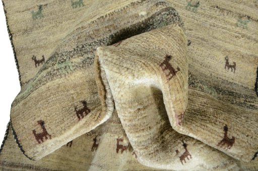 Corner detail of New Persian Gabbeh rug showing border pattern and Wool pile