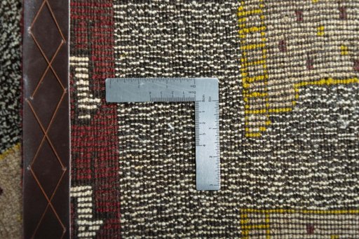 Close-up detail of 2000s Persian Gabbeh rug from Iran / Persia showing Wool weave