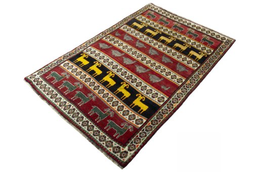 Corner detail of 2000s Persian Gabbeh rug showing border pattern and Wool pile