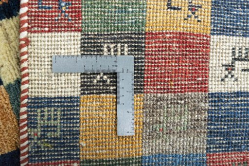 Close-up detail of 2000s Persian Gabbeh rug from Iran / Persia showing Wool weave