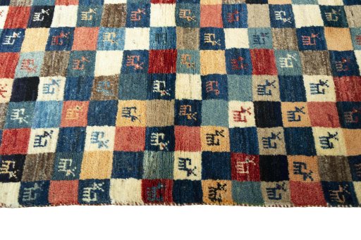 Close-up detail of 2000s Persian Gabbeh rug from Iran / Persia showing Wool weave