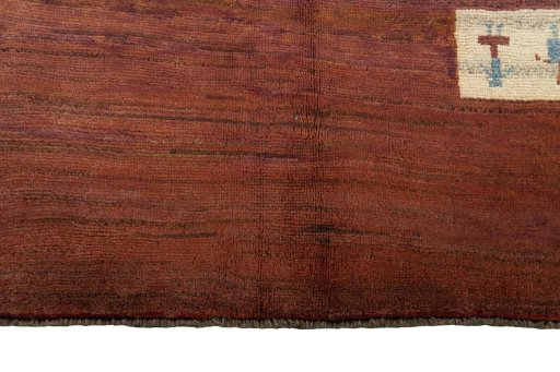 Central medallion detail of 2000s Persian Gabbeh rug from Iran / Persia