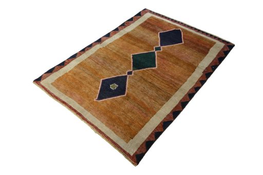 Corner detail of 2000s Persian Gabbeh rug showing border pattern and Wool pile
