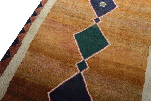 Backside of handmade 2000s Persian Gabbeh rug showing knot structure and weave density