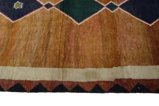 Close-up detail of 2000s Persian Gabbeh rug from Iran / Persia showing Wool weave