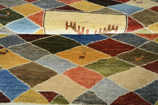 Full view of 2000s Persian Gabbeh rug from Iran / Persia, 150 × 109 cm in Multi Color tones
