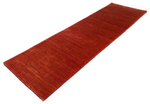Full view of New Persian Gabbeh rug from Iran / Persia, 293 × 88 cm in Red tones