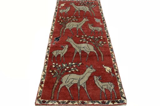 Surface texture of 2000s Persian Gabbeh rug with natural Wool and intricate pattern