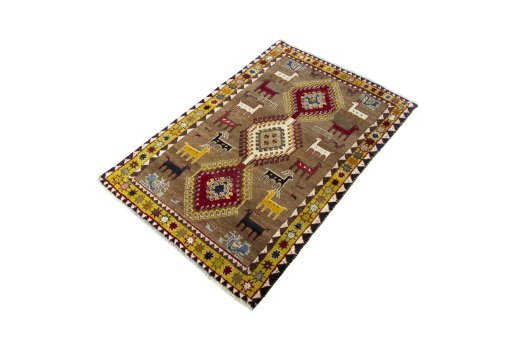 Corner detail of 2000s Persian Gabbeh rug showing border pattern and Wool pile