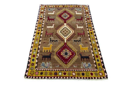 Surface texture of 2000s Persian Gabbeh rug with natural Wool and intricate pattern