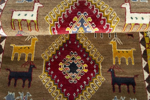 Full view of 2000s Persian Gabbeh rug from Iran / Persia, 148 × 96 cm in Beige tones