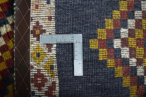 Close-up detail of 2000s Persian Gabbeh rug from Iran / Persia showing Wool weave