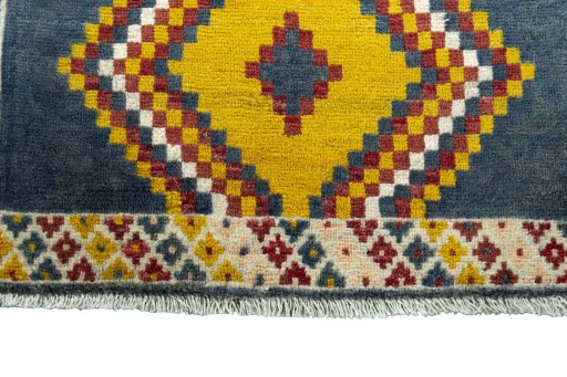 Central medallion detail of 2000s Persian Gabbeh rug from Iran / Persia